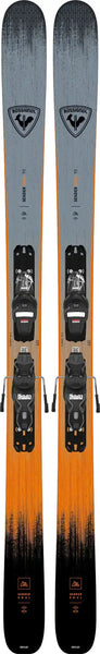 Gray and orange Rossignol skis with bindings, featuring a stylish gradient design and durable construction.